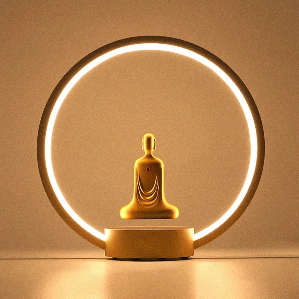 Magnetic Levitation Faceless Buddha Lamp – Gold-Plated Zen Meditation Light with Auto Rotation & Touch Control