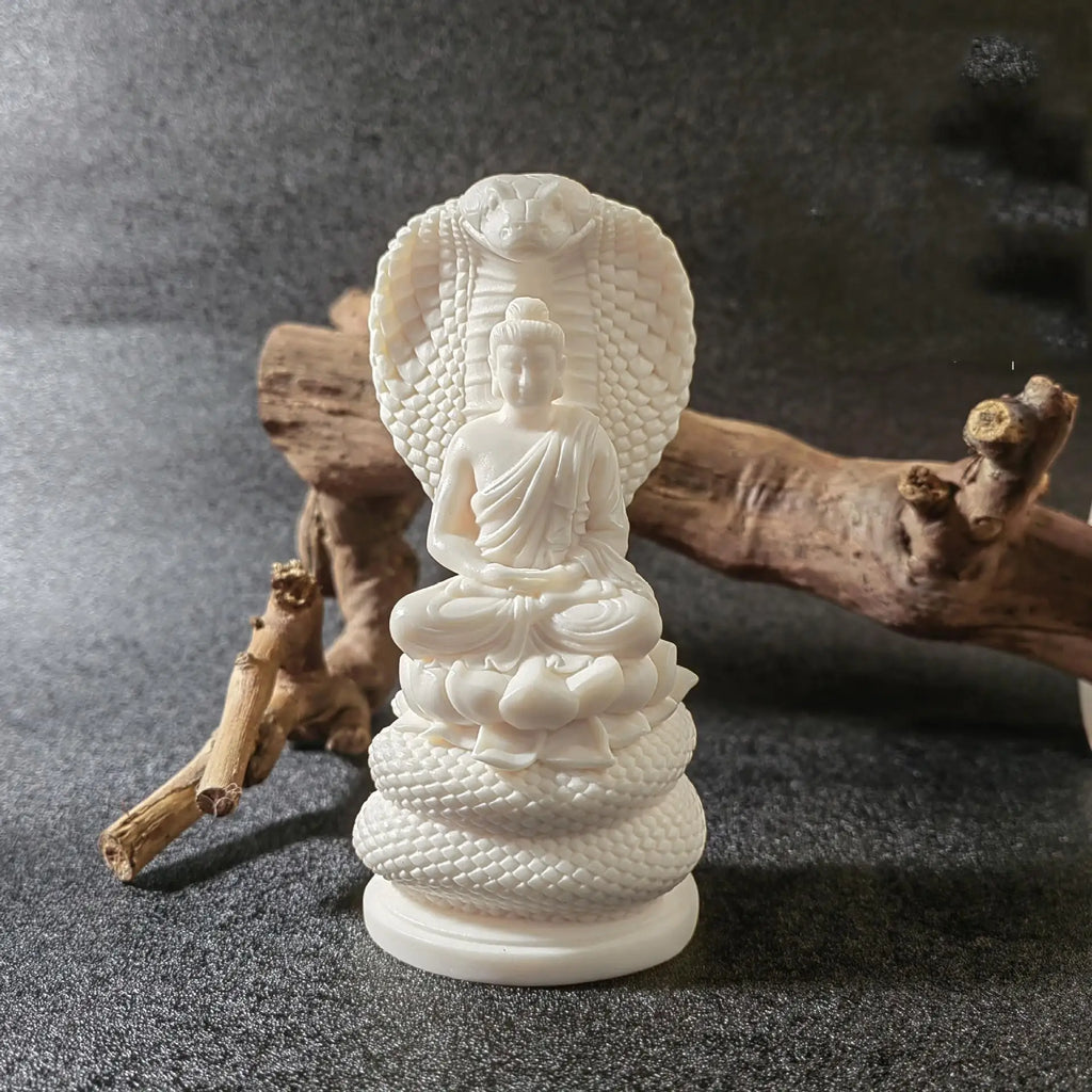 Snake-Protecting Buddha Statue – Hand-Carved Ivory Nut Ornament