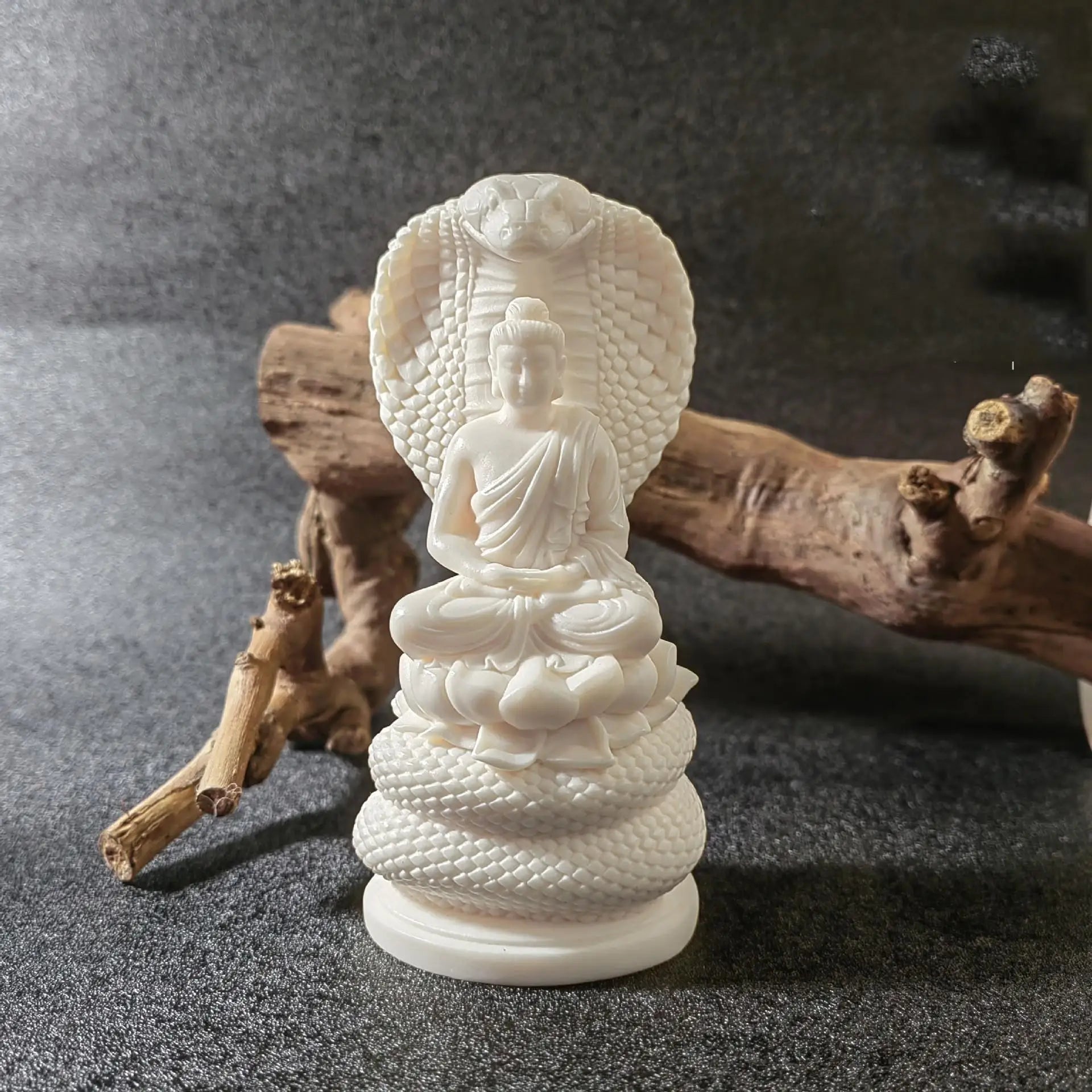 Snake-Protecting Buddha Statue – Hand-Carved Ivory Nut Ornament