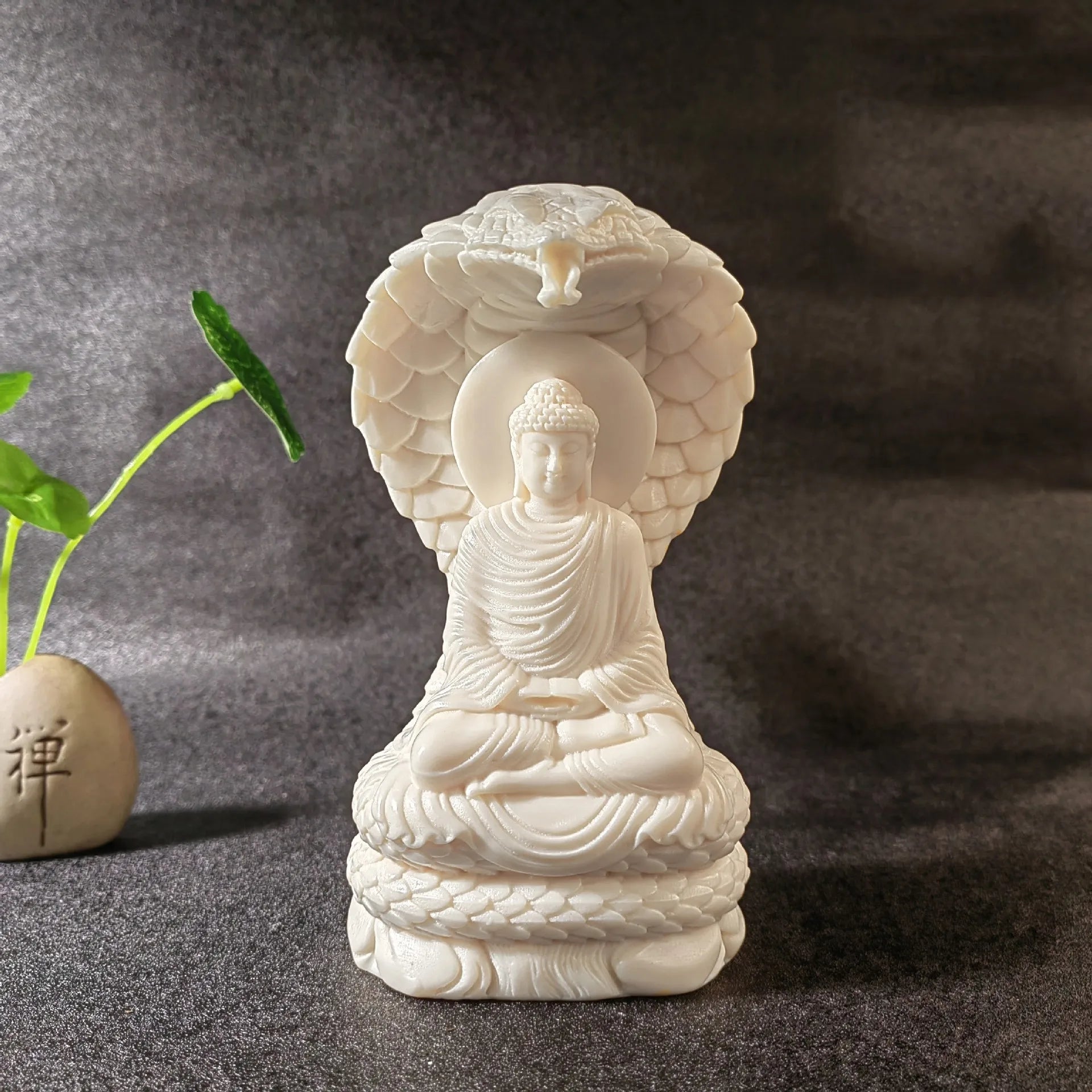 Snake-Protecting Buddha Statue – Hand-Carved Ivory Nut Ornament