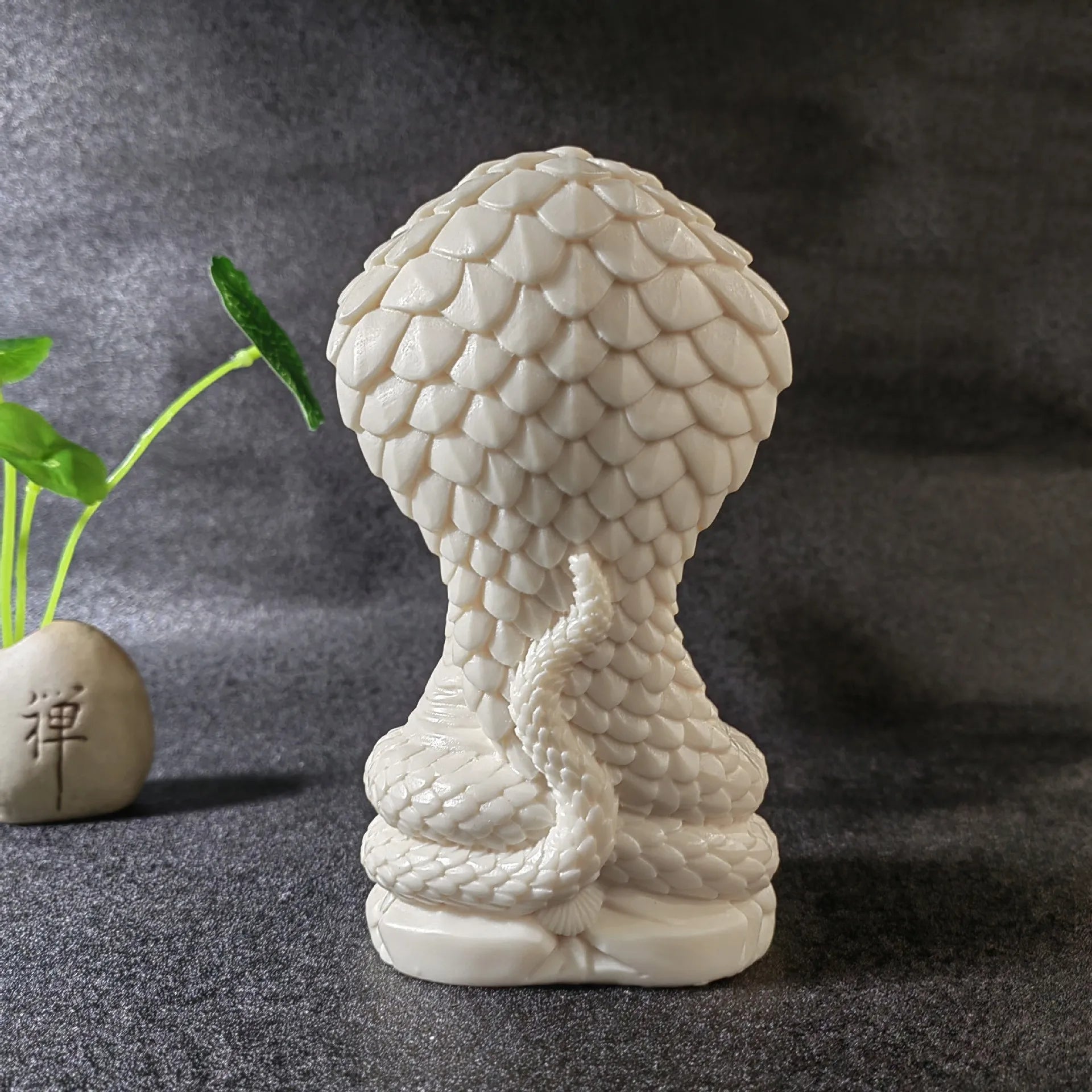 Snake-Protecting Buddha Statue – Hand-Carved Ivory Nut Ornament
